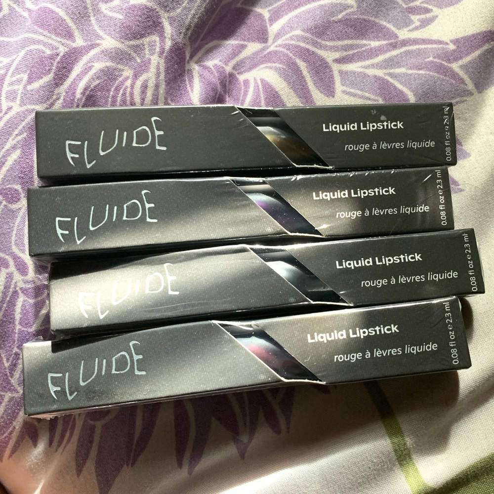 FOUR LIPSTICKS! GOLD, BLACK, PURPLE, AND DARK PINK